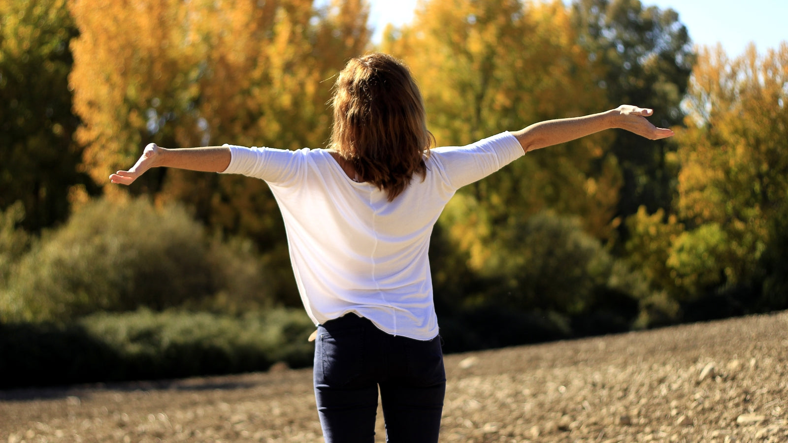 Portrait of Emily R., a smiling woman who uses SlimQuora for weight management